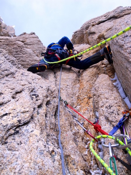 Ben dealing with the rock crux with 5.10R near the end of the 60 meter...