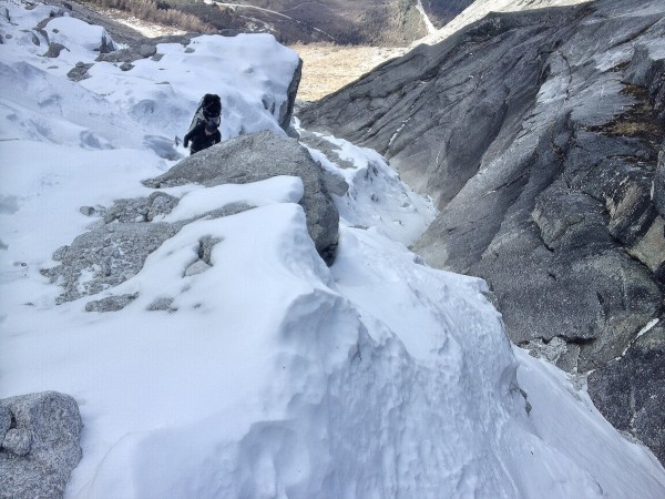 above the snowline things was an aggravating field of covered boulders...