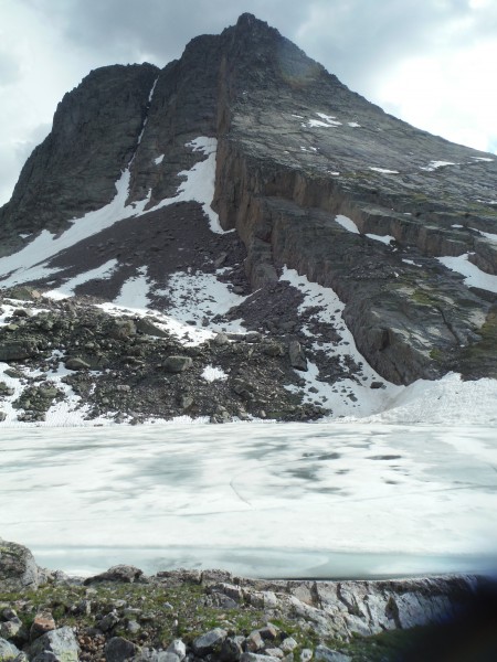 Vestal lake, still frozen, Wham Ridge is the R. skyline.