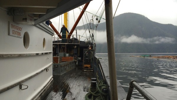 1.1 loading the hold with supplies prior to departure from gold river.