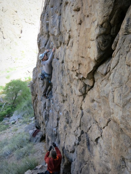 W.L. working through the steep slopers of pitch 1.