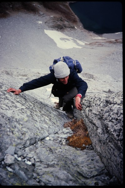 Mike Dean climbing the lower angle but still good rock above the overh...