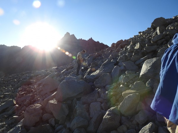 Alex hopping boulders at Middle Palisade Morraine