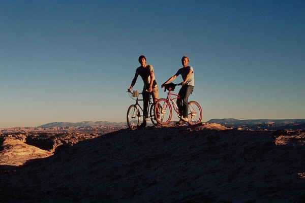 Two dudes on bikes in a world of utter magic.