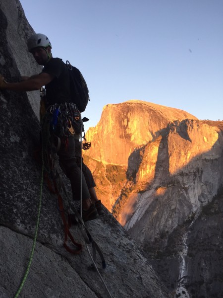 Todd leading away from the 10th anchor as the sun sets on Half Dome.