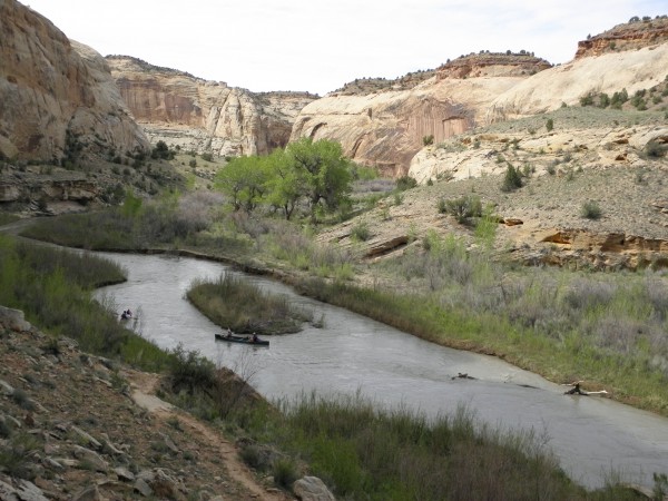 Wiser for the knowledge gained, these boaters proceed down river.