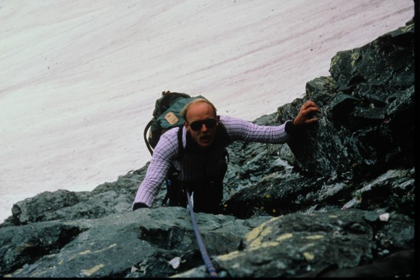 Peter climbing farther up the north face.