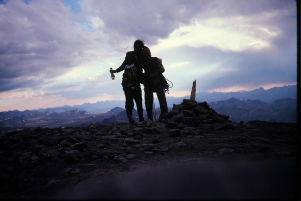 The summiteers on the summit doing summit celebratory things.