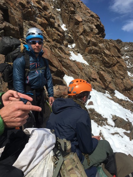 Kowalski, Mathews and Hannam between bouts of rockfall at the base of ...