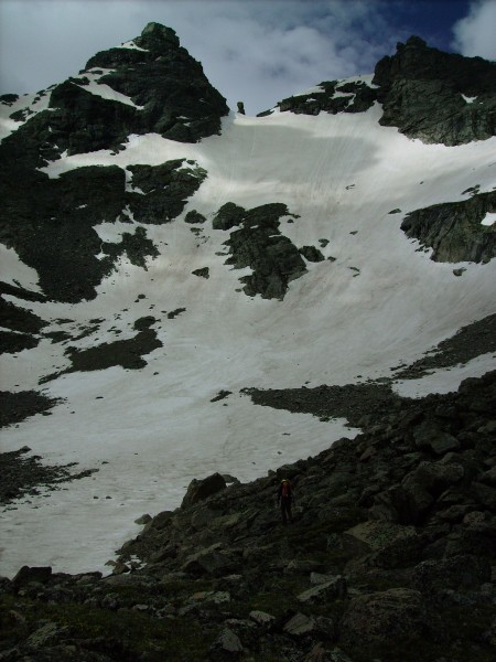 We climbed the snow to the island of rock in the middle of the snow fi...