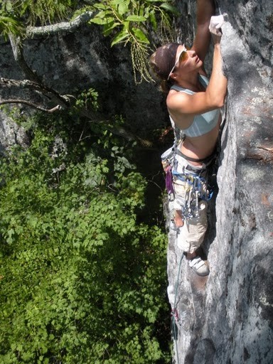 Laurie climbing something