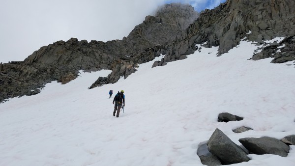 Heading across the "L" Snow Field, then a hundred meters or so up the ...