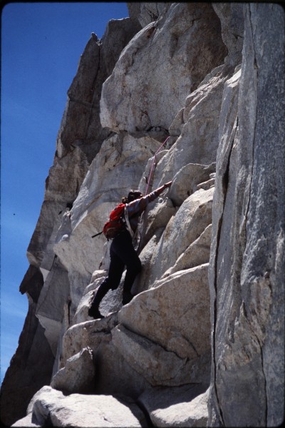 Sharon climbing up in the chimney/dihedral section.