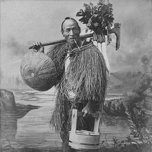 1896 photo of a raincoat clad Japanese farmer