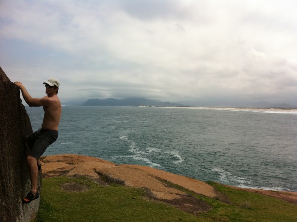 Chris McNamara bouldering at Guarda Brazil above a great surf break.