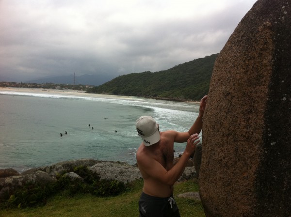 Getting ready for a problem with surfers in the background.