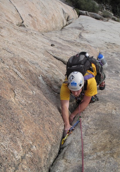 Coby Jamming the Tollhouse Traverse - pitch 1.