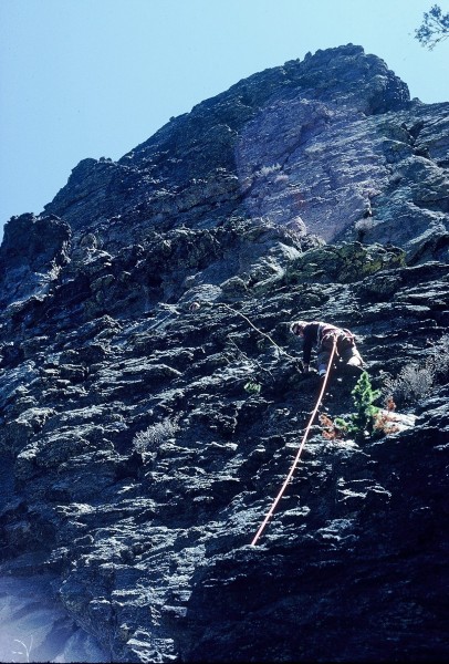 Larry Treece nearing the belay ledge; Bob is just visible &#40;head on...