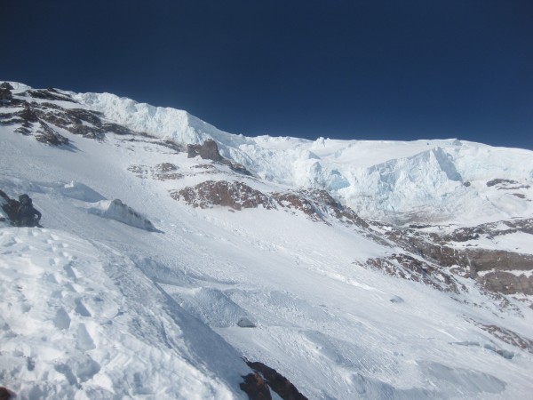 Overhanging glacier ice above us