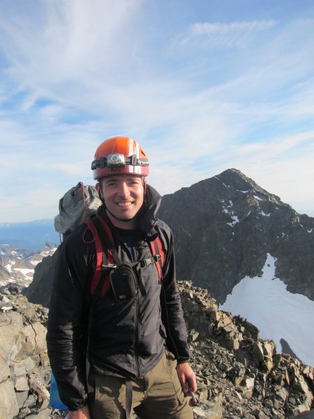 Justin on summit; Mt. Ritter's north face in background