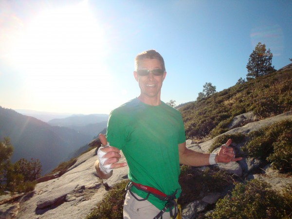 Jason trying to hold in the excitement after topping out.